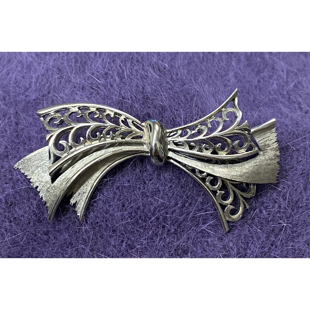 Vintage JJ Brushed Silver Tone Ribbon Brooch Open Work Bow Textured Signed